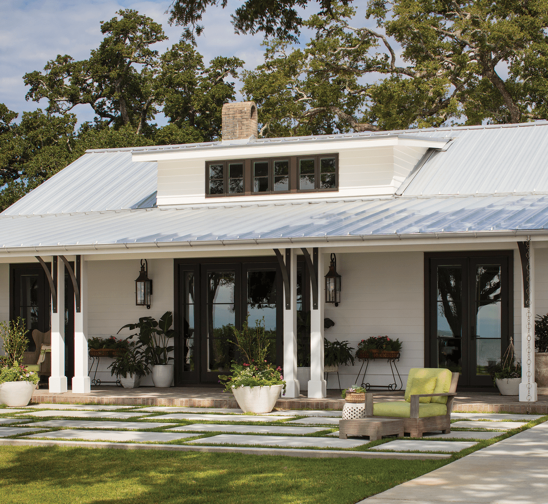 Warm and welcoming porches are a hallmark of Southern homes, and this one is no exception.